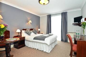 Фото номера Трехместный номер Отели типа «постель и завтрак» Hillgrove Guesthouse г. Дингл 10