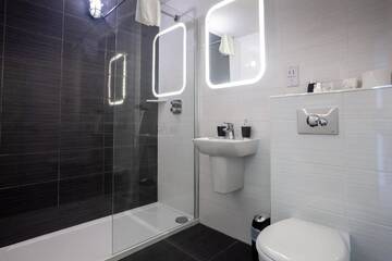 Фото номера Трехместный номер Отели типа «постель и завтрак» Hillgrove Guesthouse г. Дингл 15